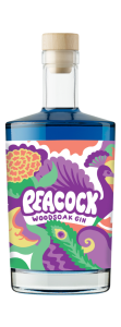 A bottle of Woodsoak Peacock Gin with vibrant blue gin and coloured label