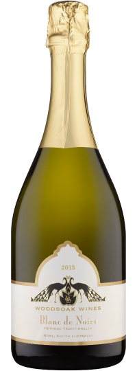 Olive green bottle with gold foil top.Decorative label with the words Woodsoak Wines Bland de Noirs 2015 and two peacocks facing each other